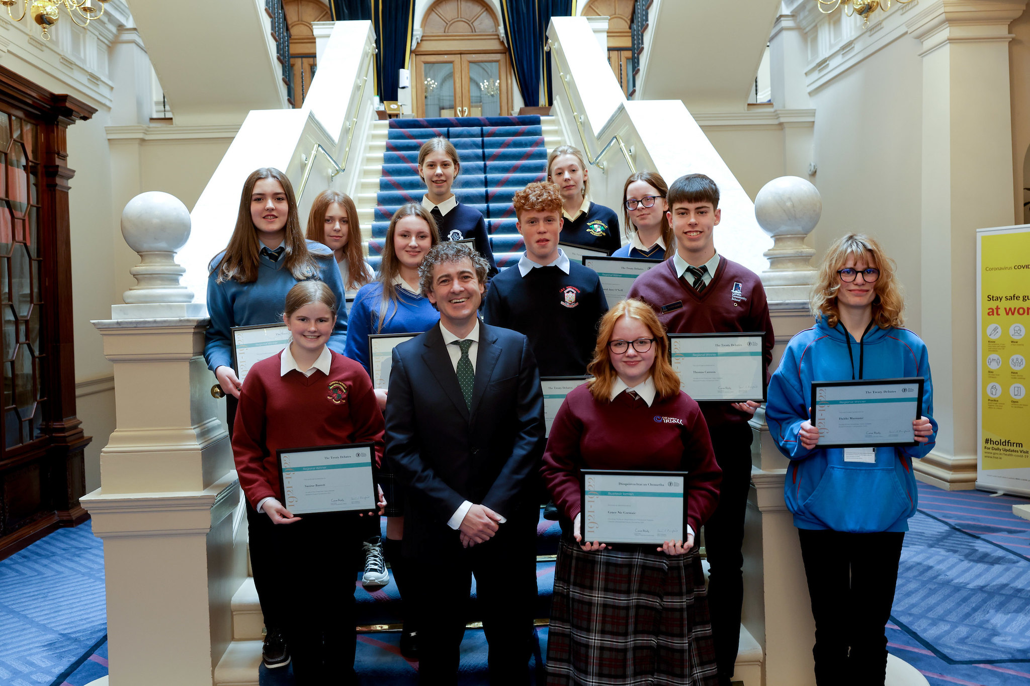 Winners of post primary research project with award certificates