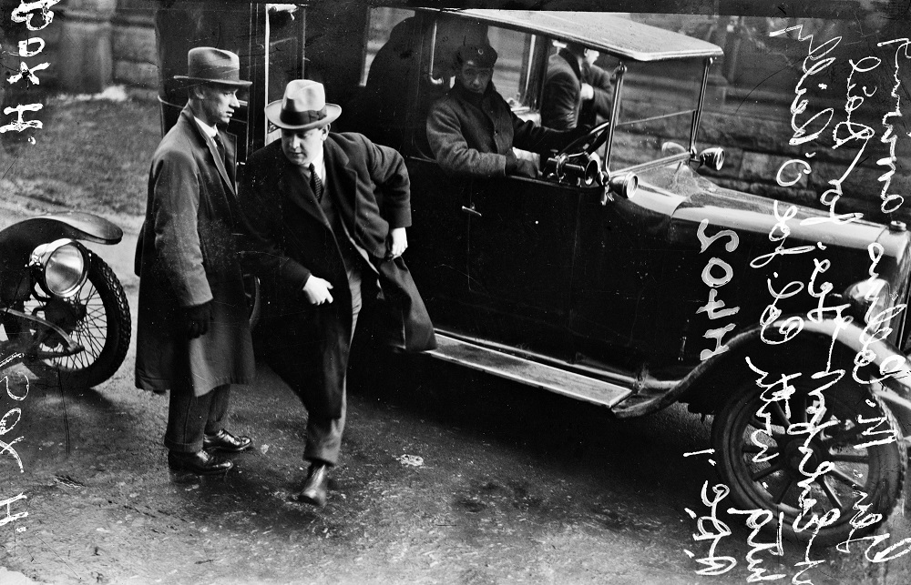 Photo of Michael Collins exiting a car, 1921