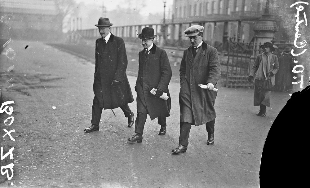 Three men walking, 1921 or 1922