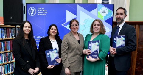 Members of the Parliamentary Research Service with copies of Research Matters publication