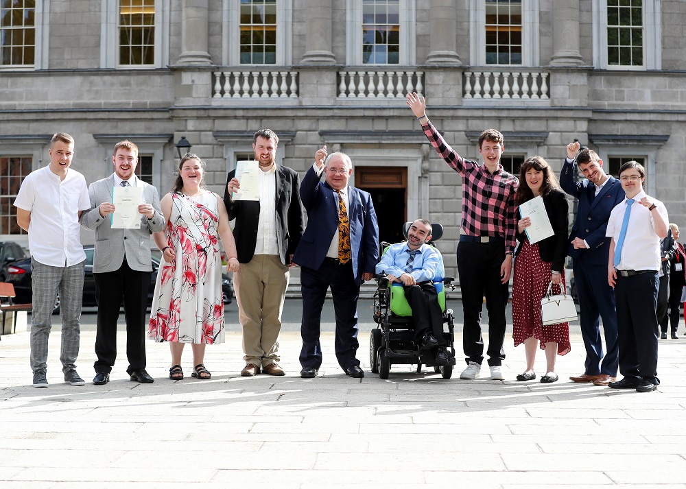 Gradutes of work experience programme for people with intellectual disabilities outside Leinster House with the Ceann Comhairle